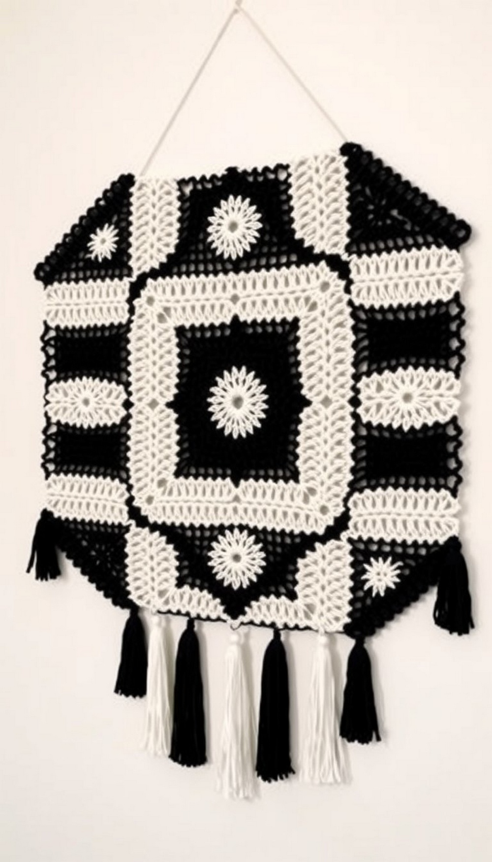 Geometric Grid with Tassel Accents